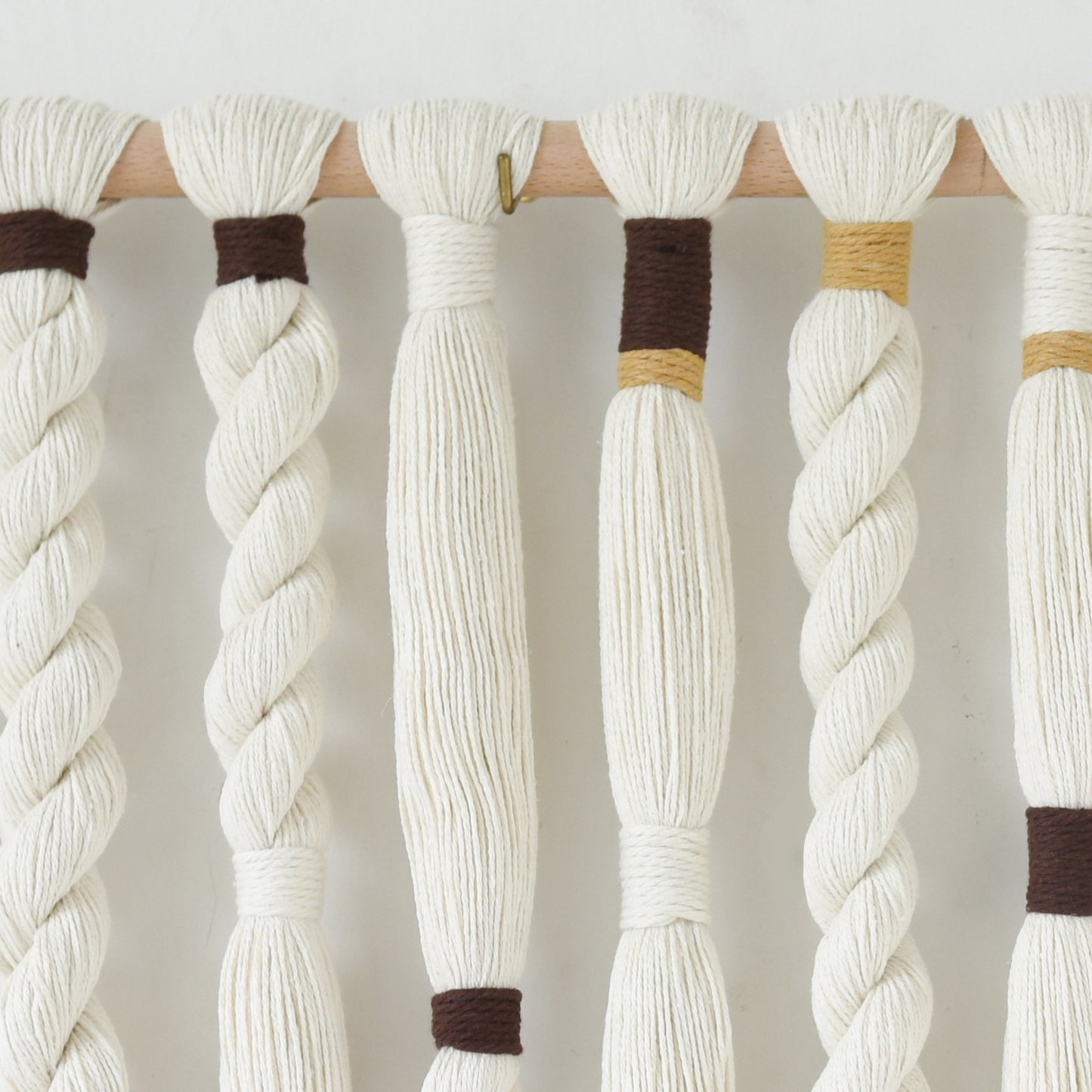 Macrame Wall Hanging with Braided Knot and Tassel Fringe